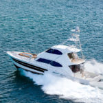 1 Riviera-77-Enclosed-Flybridge-Running-06